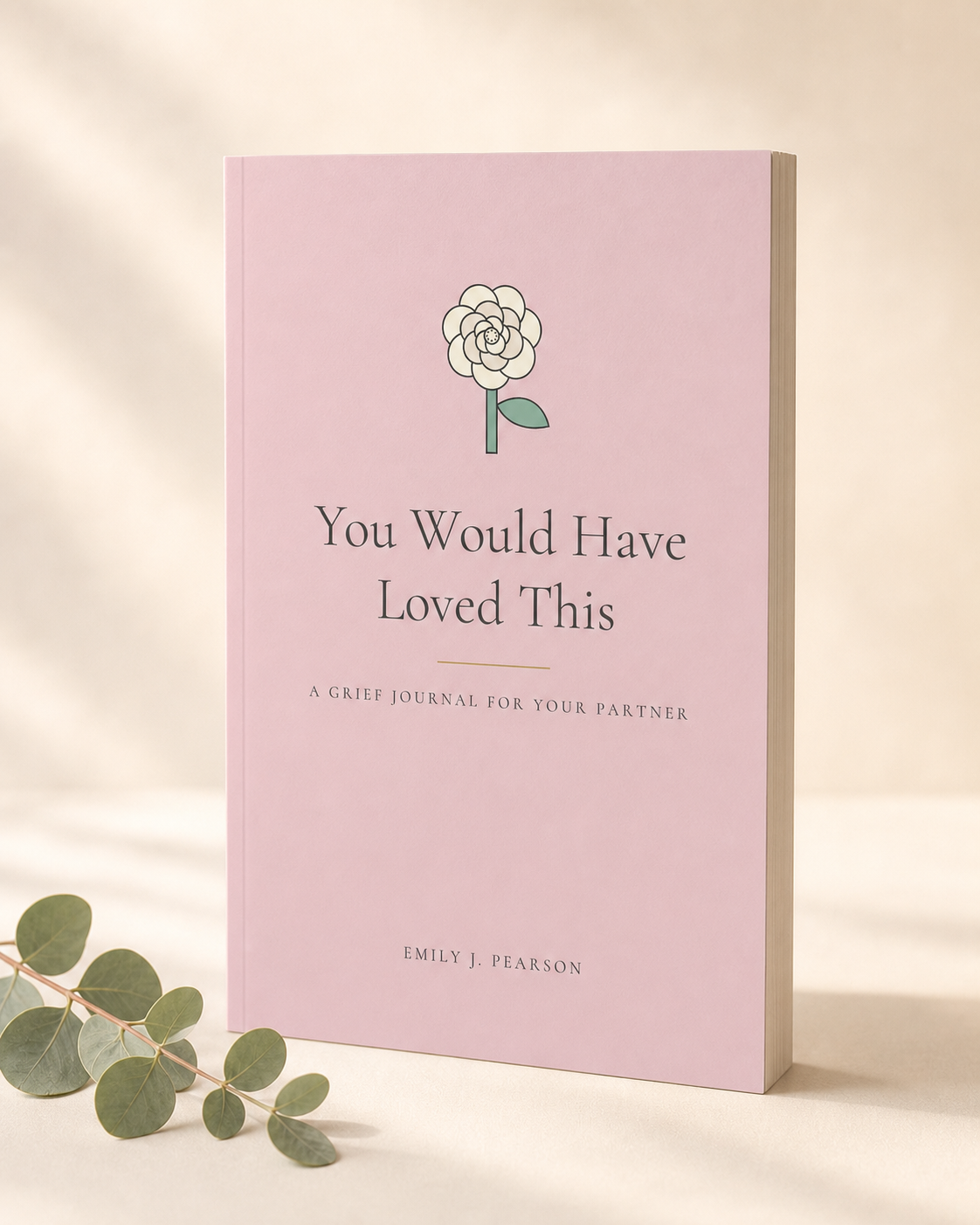You Would Have Loved This, A Grief Journal for Your Partner, paperback in warm morning light