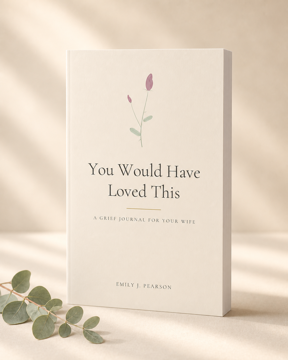You Would Have Loved This, A Grief Journal for Your Wife, paperback in warm morning light